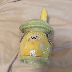 Yellow and Green Plush Toy with Straw